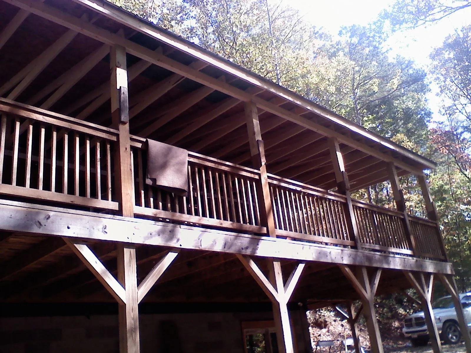 Timber framing under a new elevated porch and deck — Roof Leak Repair in Gower by Roofing Brothers